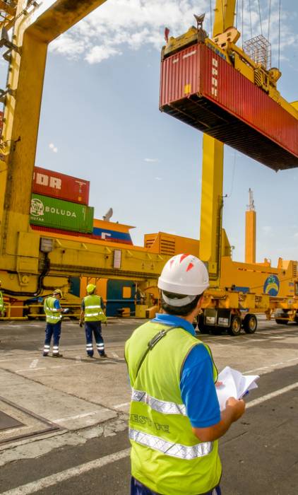 Canary islands, Spain - September 13, 2010: Container unloading control in the industrial port of Santa Cruz de Tenerife