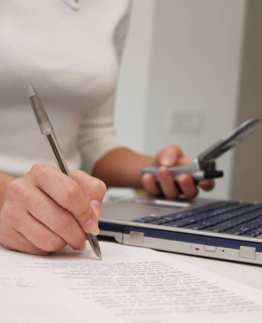 macro of old communication methods of handwriting and typing juxtaposed with new technologies for communicating